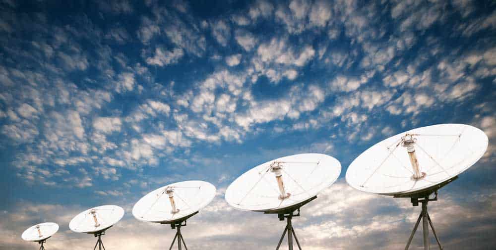 Satellite dish  antennas under a sky