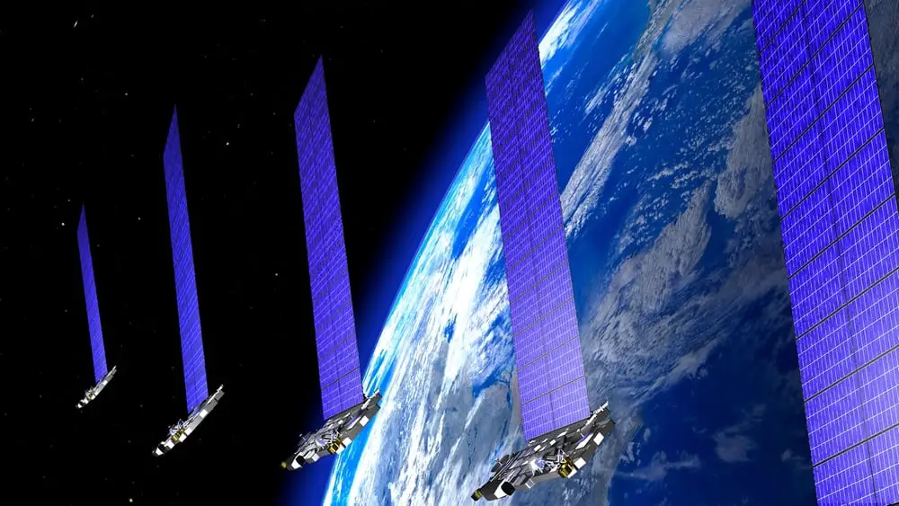 Starlink satellite train orbiting the Earth